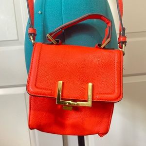 Merona Red/orange crossbody purse with gold accents